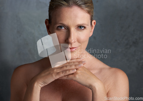 Image of Mature woman, skincare and portrait with natural beauty pride or cosmetic dermatology makeup. Isolated, gray background and female person face with facial wellness, self care and anti aging cosmetics