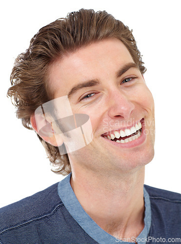 Image of Confidence, portrait and male model in a studio with a positive, confident and good mindset. Funny, smile and headshot face of a handsome, young and casual man laughing isolated by a white background