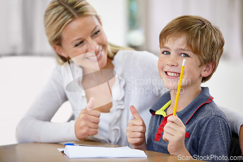 Image of Portrait, child and teacher with thumbs up in classroom, smile and pencil. Happiness, educator and student with hand gesture for like emoji, agreement and learning in elementary school for education.