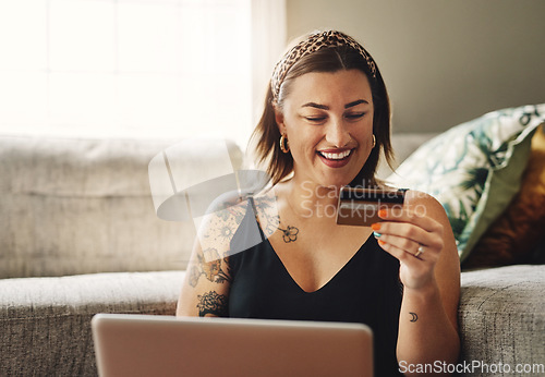 Image of Credit card, happy woman and home, computer and online shopping, ecommerce or fintech application, loan or finance. Person on laptop, website payment or internet banking with security pin or numbers