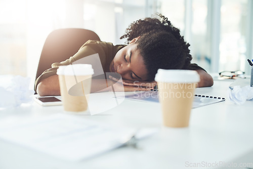 Image of Tired, sleeping and business woman on desk with fatigue, stress and exhausted working in office. Burnout, overworked and lazy African female worker overwhelmed for deadline, workload and pressure