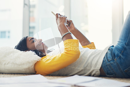 Image of Home floor, cellphone and relax woman scroll, typing and texting social media user, gen z contact or person. Mobile smartphone connection, digital communication and female student using phone app