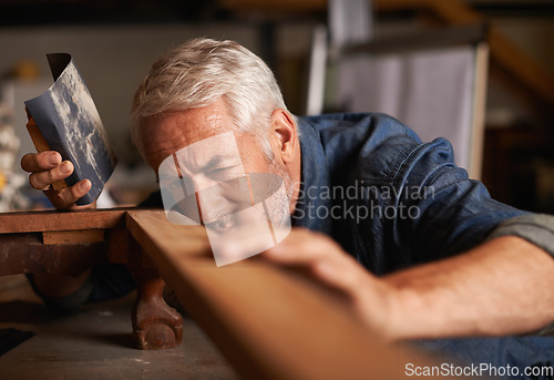 Image of Carpenter, construction and senior man with wood project, thinking and checking with development. Mature male employee, entrepreneur or contractor with maintenance, renovation and handyman with tools