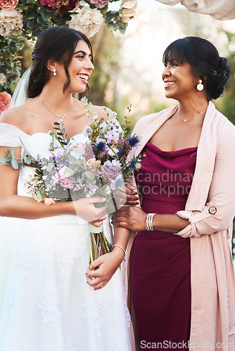 Image of Bride, mother and wedding day with happiness and family bonding at celebration marriage. Happy, smile and mom with daughter together at love and commitment event outdoor with flower bouquet and mama