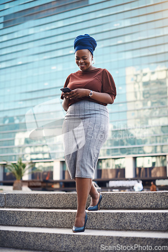 Image of Black woman, phone and city walking of a happy employee with smile and social network app. African female person, mobile communication text and networking with tech and internet by urban streets