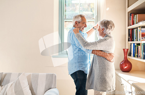 Image of Elderly couple, dancing and home living room with smile, happiness or love for care, support or laugh. Senior man, excited old woman or dance together in house with romance, comic bonding and space