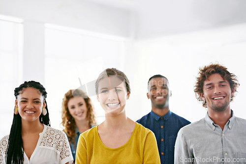 Image of Business, group and staff with a smile, portrait and teamwork with partnership, collaboration and diversity. Face, female leader and happy employees with management, skills and multiracial people