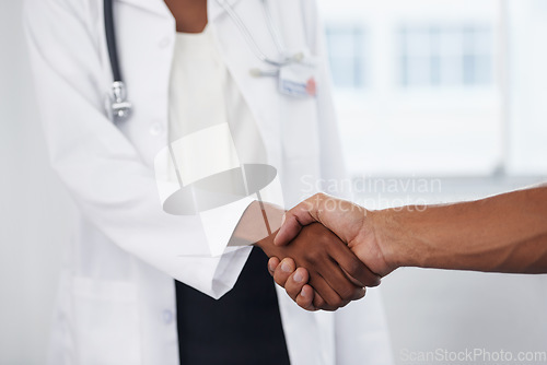 Image of Closeup, doctor and patient with a handshake, agreement and thank you for results, healthcare and wellness. Zoom, female employee or medical professional with a male client, greeting and hand gesture
