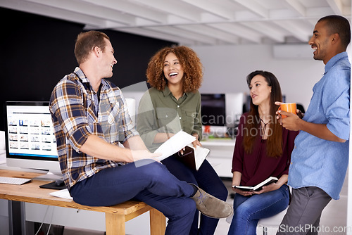 Image of Team laughing, meeting and documents in office for planning, strategy and happiness with support. Group, business people and comic conversation with men, women and diversity for friends at startup