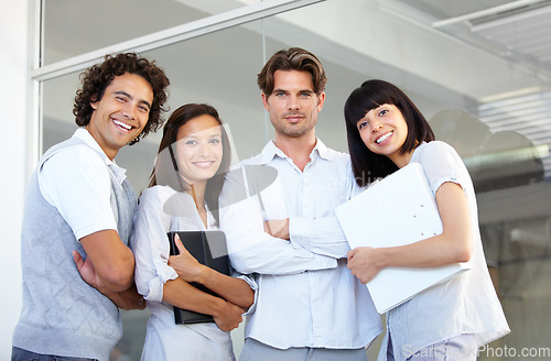 Image of Business people, portrait smile and arms crossed in teamwork, leadership or management at the office. Happy employee professional standing in confidence for team building together at the workplace