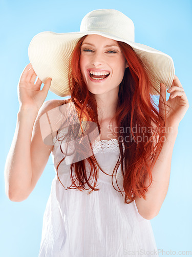 Image of Happy woman, portrait and summer hat on blue sky with style, confidence and smile for outdoor vacation. Female person laughing in sunshine with fashion, head accessory and freedom to relax on holiday