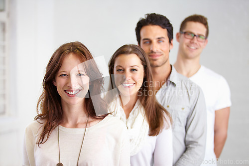 Image of Portrait, group and business people in a row with leadership in office workplace together. Smile, friends and employees standing in line or queue with teamwork, collaboration or solidarity in company
