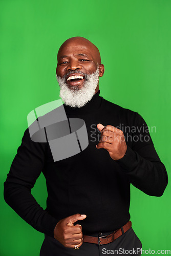 Image of Happy, dance and portrait of black man on green screen for celebration, music or excited. Happiness, smile and energy with senior person dancing isolated on studio background for freedom and movement