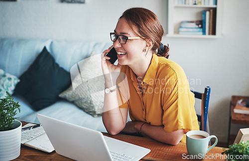 Image of Remote work, phone and woman employee on a call happy about conversation on a cellphone in her home or house. Laptop, freelancer and happy female communication worker working in her apartment