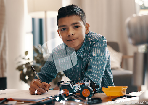 Image of Learning, writing and portrait of kid with robotics homework, homeschool and science for tech project. Taking notes, car robot and boy child with knowledge, education and studying in house alone.