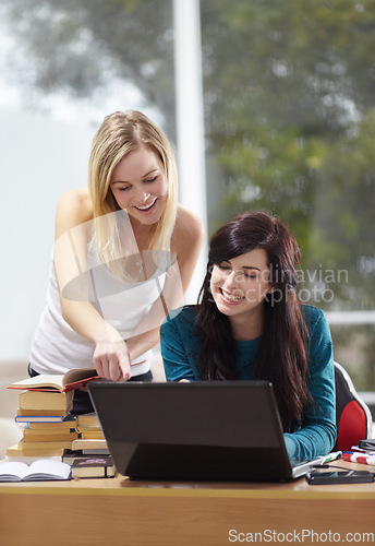 Image of Creative, team and business women on a laptop in office for planning, teamwork and strategy. Coaching, mentor and happy female colleagues online for feedback, review and advice for proposal plan