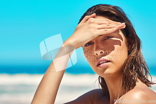 Image of Portrait, sunshine and woman at the beach, holiday and summer getaway on a weekend break, relax and trip. Face, female person and happy girl with seaside vacation, sunlight and travel with wellness