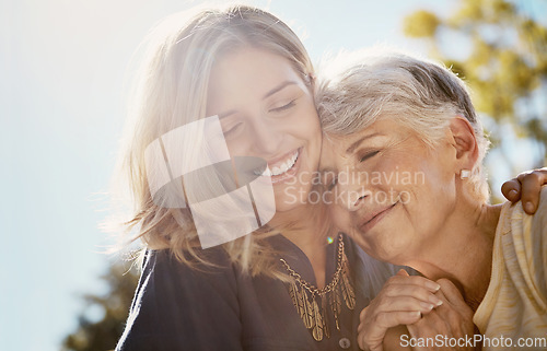 Image of Family, love or smile with a senior mother and daughter bonding outdoor together during a summer day. Happy, flare and retirement with a young man hugging her elderly parent outside in the park