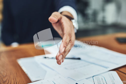 Image of Businessman, handshake and meeting for b2b, deal or document agreement at the office. Man employee shaking hands for introduction, greeting or hiring in recruitment for business growth at workplace