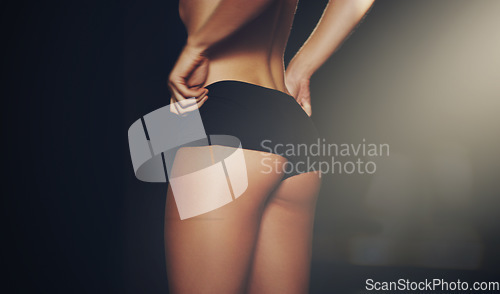 Image of Rear view of woman, butt and black underwear on studio background for weightloss mockup, diet and slim size. Closeup female model, ass and sexy lingerie of aesthetic liposuction, beauty and fit body