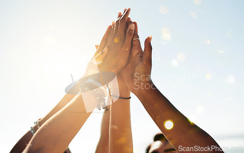 Image of Hands, high five and closeup group of people outdoor for solidarity, trust and goal collaboration. People, commitment and friends with hand in support of success, celebration and partnership or unity