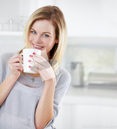 Image of Relax, smile and portrait of woman with coffee in a kitchen, calm and content in her home. Happy, face and female drinking tea in her apartment, peaceful and confident with a comforting morning drink