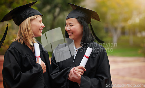 Image of Graduation, girl friends and study certificate of students with happy communication outdoor. Female student and campus graduate with happiness and college achievement with diversity for degree