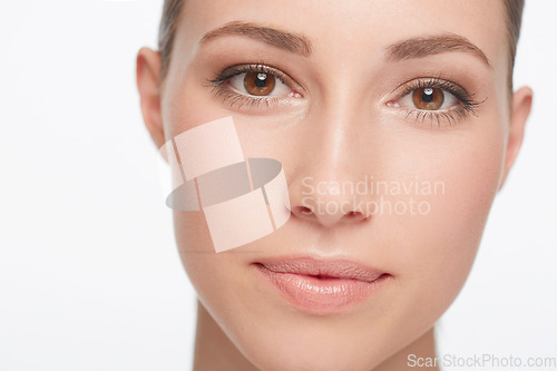 Image of Portrait, beauty and woman with dermatology, skincare and confident girl isolated against a white studio background. Face, female person and model with organic facial, treatment and grooming routine