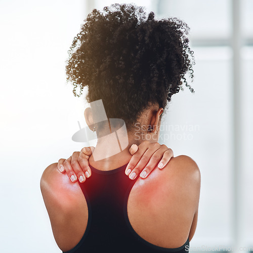 Image of Rear view, young black woman and suffering from back pain or wearing sports bra or shoulder health and on white background. Afro, girl person and feeling hurt from gym or joint ache and fibromyalgia