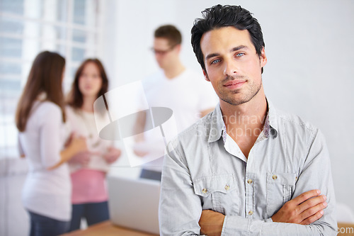 Image of Serious, portrait and business man with arms crossed in office, workplace or company. Face, confidence and male professional, entrepreneur or person with pride for career, job and success mindset.