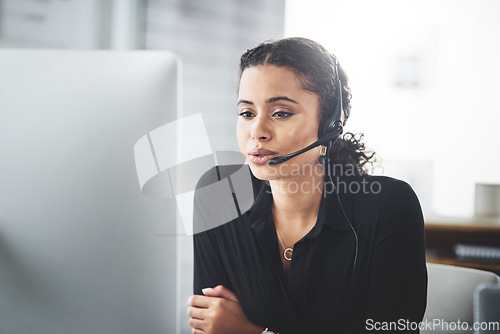 Image of Webinar, call centre and woman consultant talking online for advice or insurance telemarketing in an office. Contact us, customer support and female sales employee or worker consulting at agency
