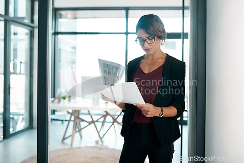 Image of Documents, reading and business woman in workplace for data analysis, statistics report and spreadsheet review or budget. Professional worker, accountant or person with paperwork, accounting or taxes