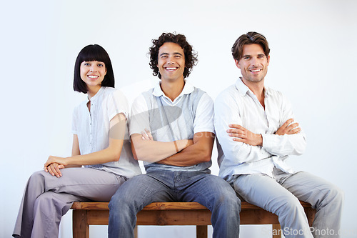 Image of Team, happy and portrait of business people on bench for collaboration, teamwork and partnership. Startup, company and men and woman workers on white background with pride, smile and confidence