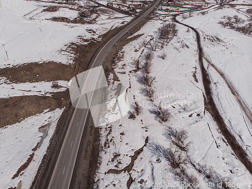 Image of Aerial view of a winter road