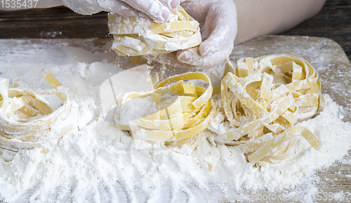 Image of several twisted long pasta