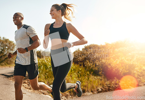 Image of Fitness, running and health with couple in road for workout, cardio performance and summer. Marathon, exercise and teamwork with black man and woman runner in nature for sports, training and race