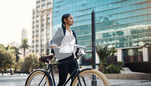 Image of Travel, city and professional woman with a bicycle in the morning walking in the street to work. Eco friendly, transport and business female employee commuting to the office with a bike in urban town