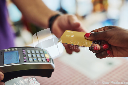 Image of Closeup, hands and payment with machine, credit card and retail with payment, transaction and shopping. Woman, customer and employee with sale, discount and buying with services, banking and profit