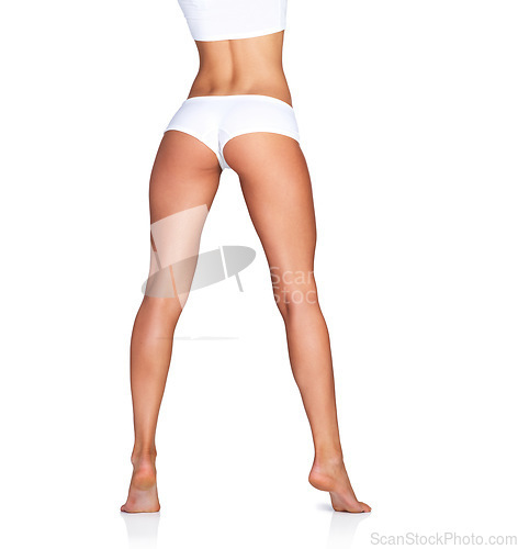 Image of Woman, legs and skincare rear view on mockup in studio for grooming, smooth and soft on white background. Feet, leg and girl model relax in underwear for skin, glow or luxury wellness while isolated