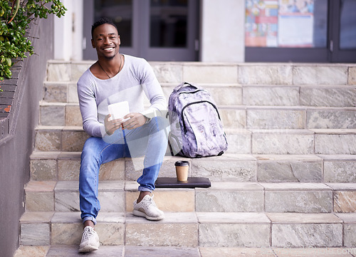 Image of Relax, college and tablet with portrait of black man for learning, education or research. Smile, social media and technology with male student on stairs of university campus for app, digital or study