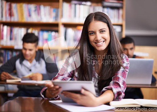Image of University, tablet and portrait of woman in library for online research, studying and learning. Education, academy and happy female student on digital tech for knowledge, internet and website course