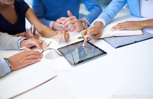 Image of Hands, group and tablet on desk for teamwork, business people or planning strategy together in workplace. Team building, touchscreen and analysis for ideas, brainstorming or problem solving in office