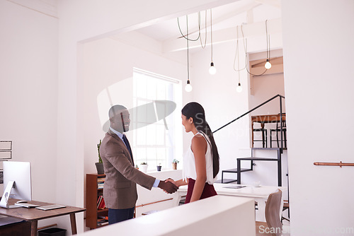 Image of Happy black man, business people and handshake for teamwork, trust and thank you in office. Employees shaking hands for partnership, collaboration and support of b2b networking, welcome and agreement