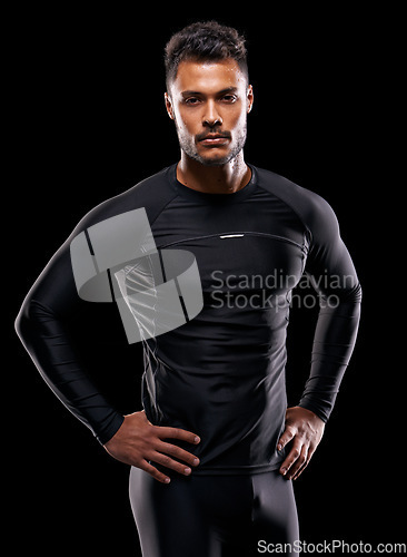 Image of Portrait, fitness and man with exercise, workout and confident guy on a dark studio background. Face, male athlete or model with wellness, balance and training with goals, target or healthy lifestyle