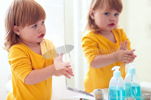 Image of Cleaning, hygiene and washing hands with little girl in bathroom for morning routine, health and learning. Growth, self care and bacteria with baby at home for grooming, sanitary and protection