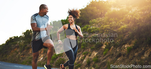 Image of Fitness, exercise and couple running in nature by a mountain training for a race, marathon or competition. Sports, health and athletes or runners doing an outdoor cardio workout together at sunset.