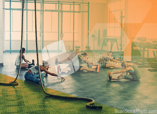 Image of Gym, fitness and group stretching for exercise, workout and training in class. Athlete men and women together on ground for power challenge, warm up and strong muscle at health club with a overlay