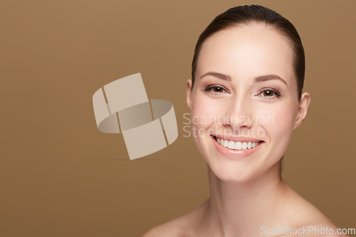 Image of Portrait, mockup and woman with beauty, skincare and confident against a brown studio background. Face, female person and model with a smile, cosmetics and salon treatment with luxury and grooming