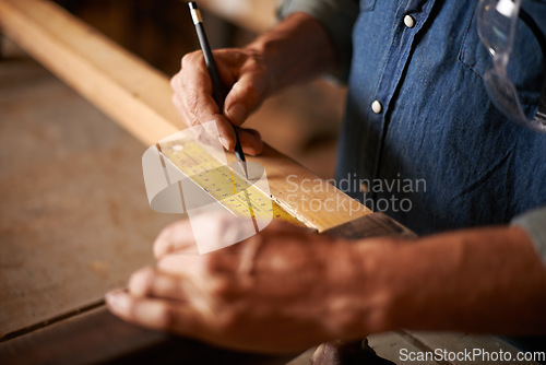 Image of Carpentry, measurement and man hands with pencil, ruler and designer furniture manufacturing workshop. Creativity, small business and professional carpenter planning sustainable wood project design.