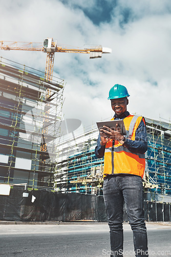 Image of Construction, tablet and engineer man outdoor for project management, development and architecture. Happy black male contractor with mobile app for engineering and safety inspection or city planning